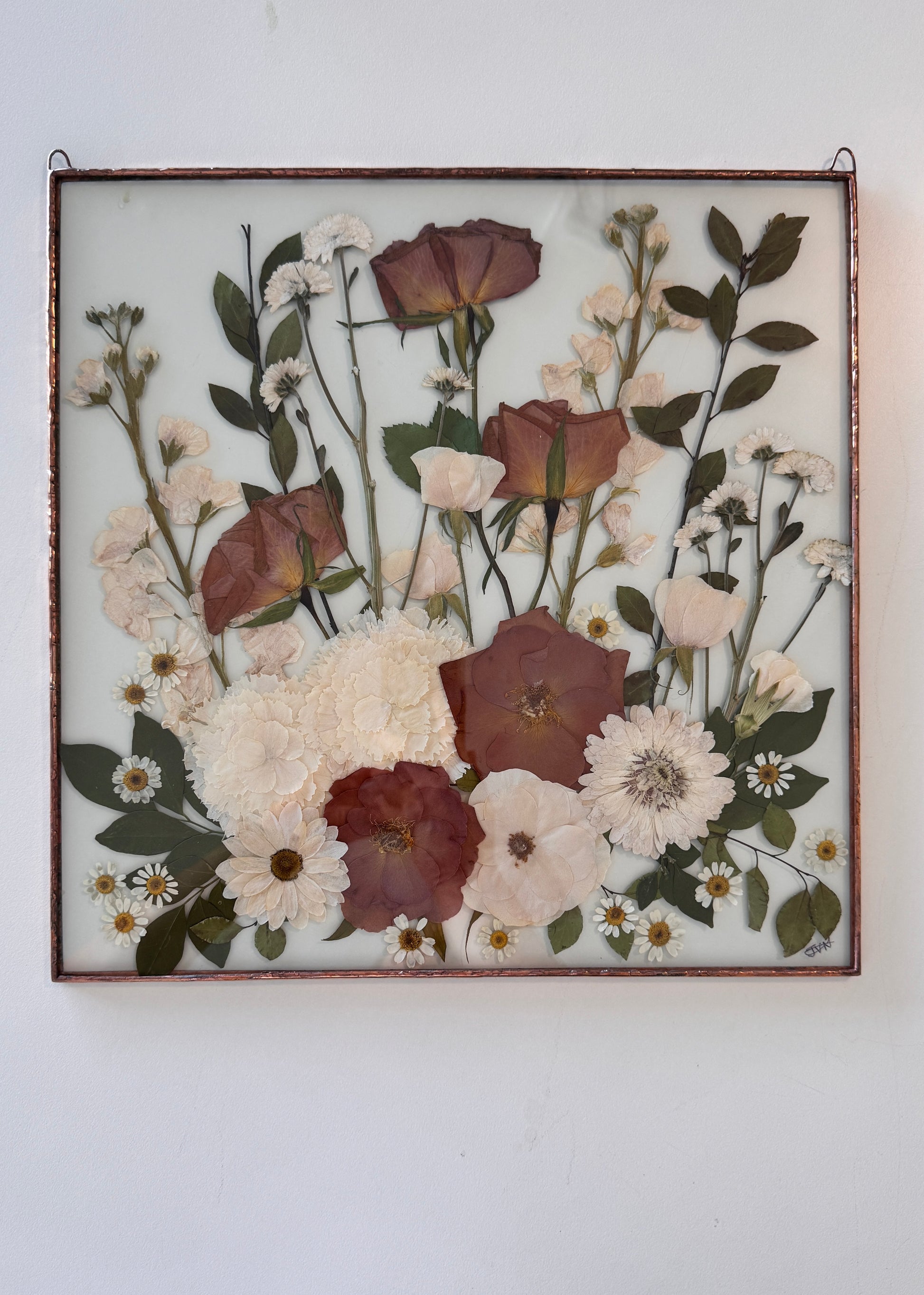 White and copper coloured wedding bouquet