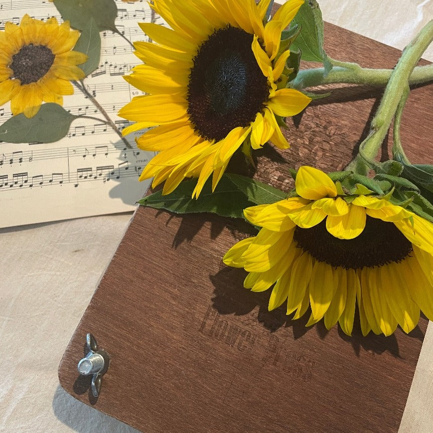 press a sunflower in a traditional press