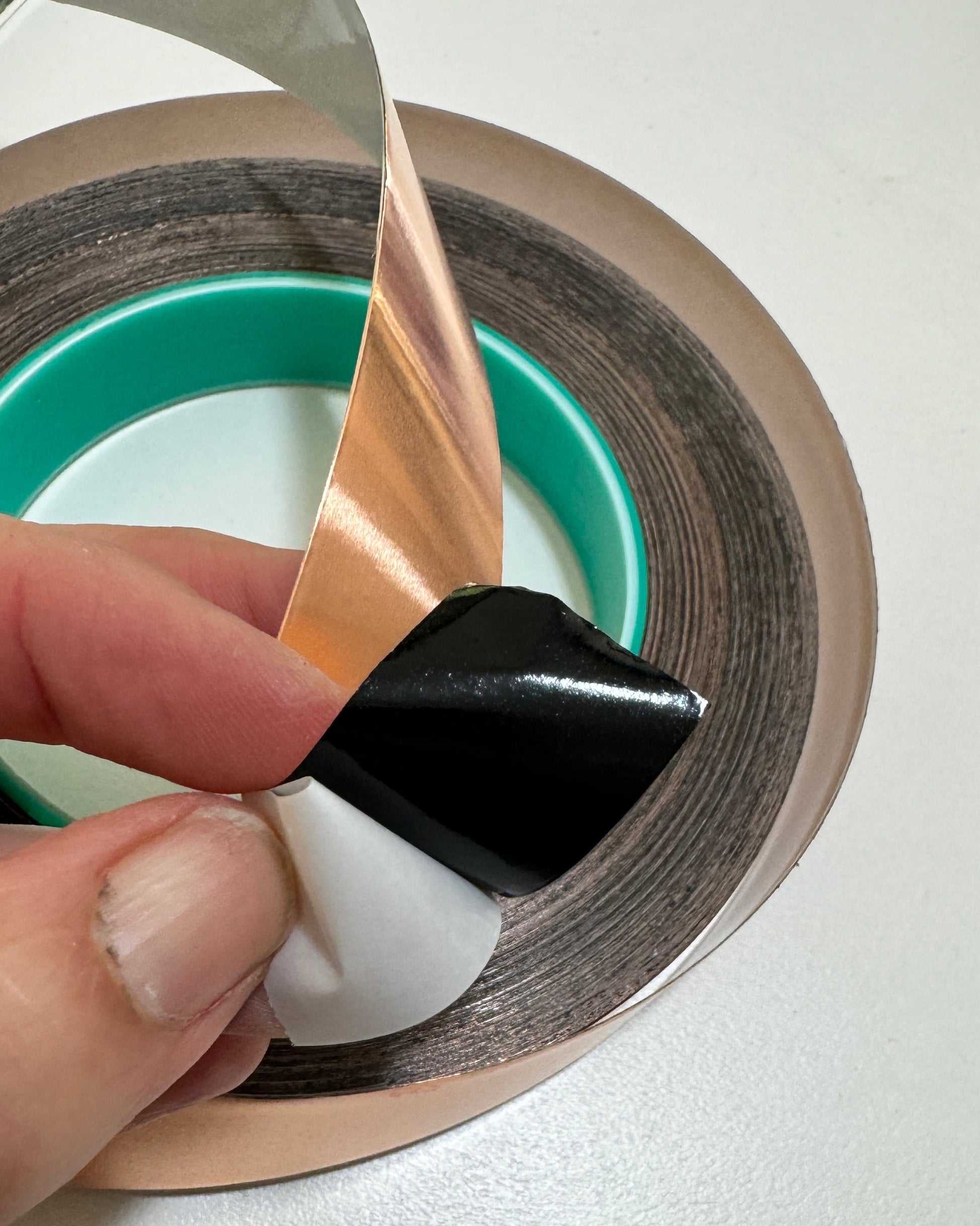 Close up of wide, strong copperfoil for stained glassing
