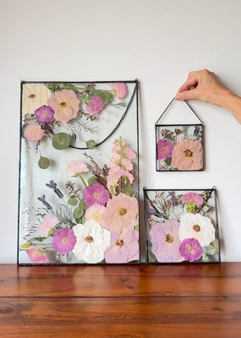 Cutest little pink and purple pressed flower set to display together.