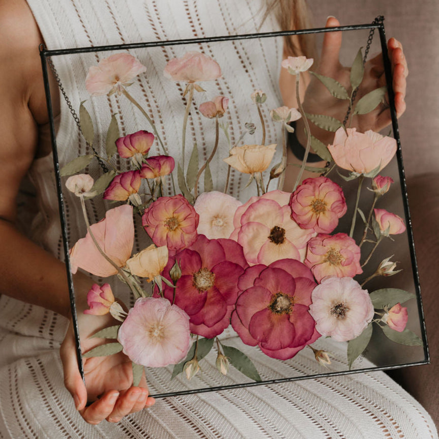 Shades of roses and Ranunculus pressed