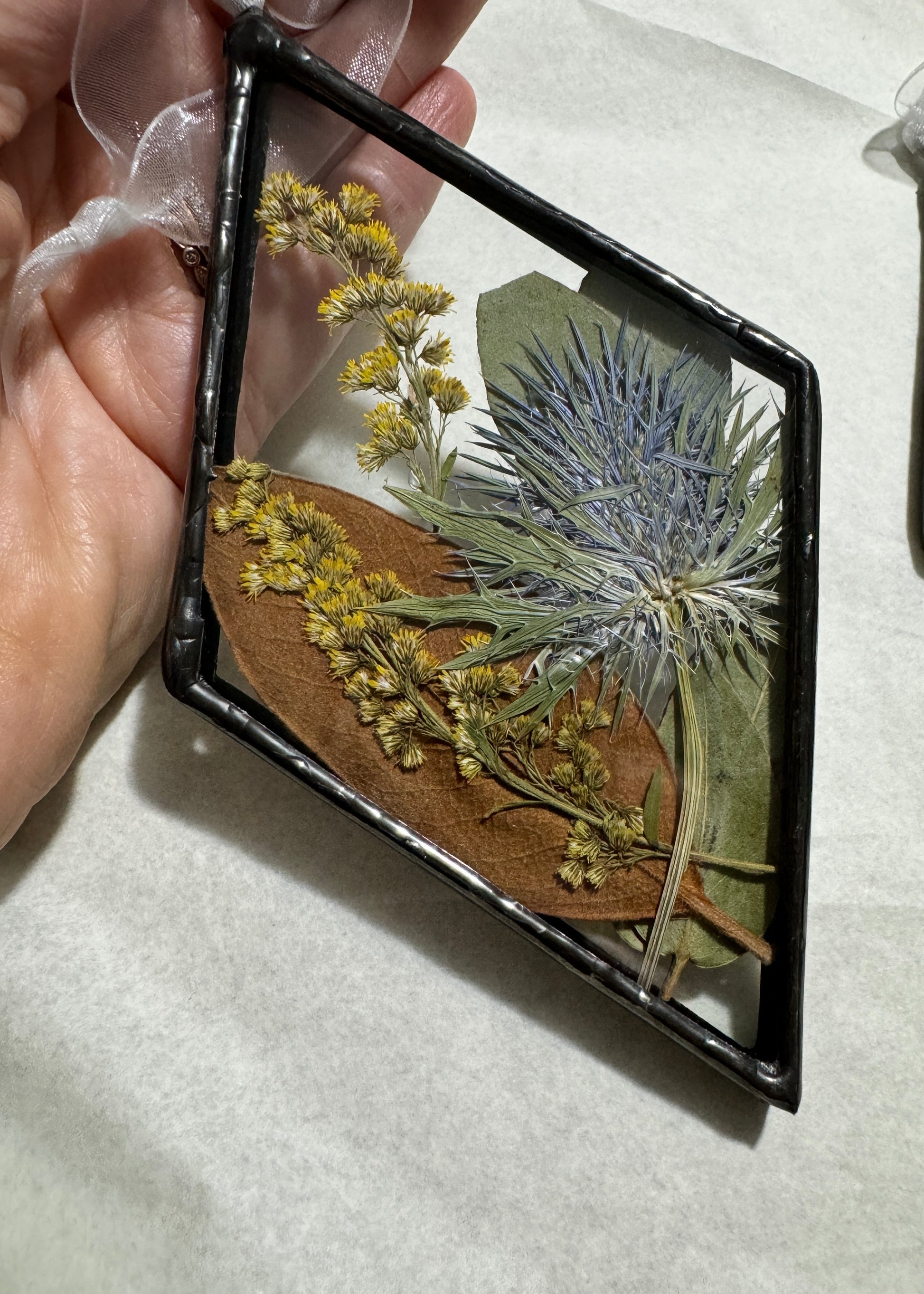 Sea holly ornament soldered